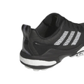 Rear side view of the Adidas CodeChaos 25 Golf Shoes in black, showing a supportive heel tab, textured synthetic upper, and signature Adidas three stripes in white. The midsole features Boost cushioning for comfort, with a durable outsole for enhanced grip.