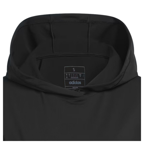 Close-up view of the hood from the Adidas women's performance golf hoodie in black. The interior label is visible, showing size and Adidas branding. The fabric appears smooth and lightweight.