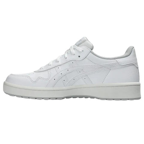 The Asics Japan S Womens Golf Shoes feature a white low-top silhouette inspired by retro golf styles, with lace-up closure, subtle side stitching, and a textured sole, shown in side profile on a plain white background.