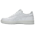 The Asics Japan S Women's Golf Shoes feature a white low-top silhouette inspired by retro golf styles, with lace-up closure, subtle side stitching, and a textured sole.