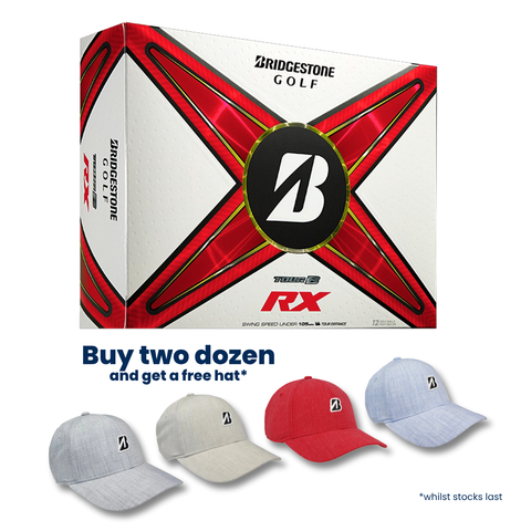 A box of Bridgestone 2024 Tour B RX Golf Balls is displayed above four caps in gray, light gray, red, and blue. Text: “Buy two dozen and get a free hat*.” Note: “*whilst stocks last.”.