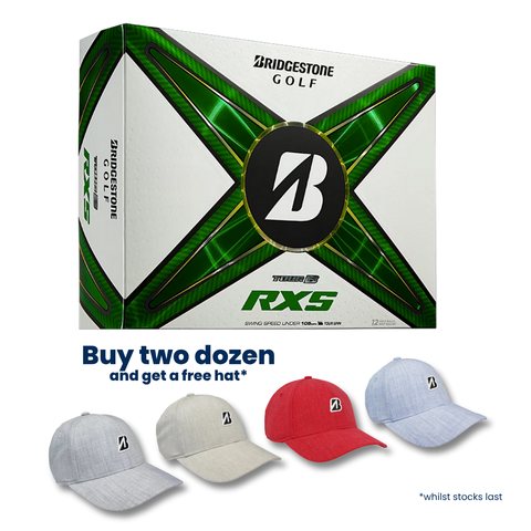 A box of Bridgestone 2024 Tour B RXS Golf Balls above four Bridgestone hats in gray, red, and blue. Text: Buy two dozen, get a free hat*—soft feel on every shot. *While stocks last.