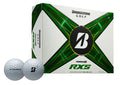 Box of Bridgestone Tour B RXS Mindset Golf Balls with two white balls.