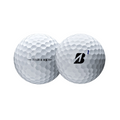Two white Bridgestone 2024 Tour B XS golf balls, each marked with the TOUR B XS text and number 1, sit side by side on a white background, highlighting their dimpled surfaces and high spin performance.