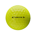 A bright yellow Bridgestone 2024 Tour B XS golf ball features visible dimples, black TOUR B XS text with double arrows, and is engineered for high spin and tour-level performance.