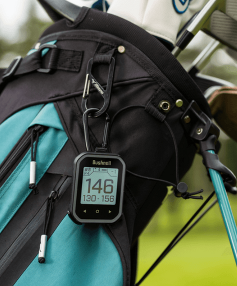 Bushnell Phantom 3 Slope GPS on a golf bag with distances showing on the screen