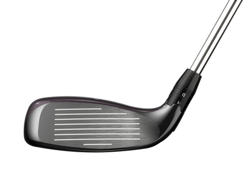 A close-up of the Callaway 2023 Women's Big Bertha Reva Hybrid golf club head highlights its grooved face and part of the shaft, designed for easy launch, against a white background.