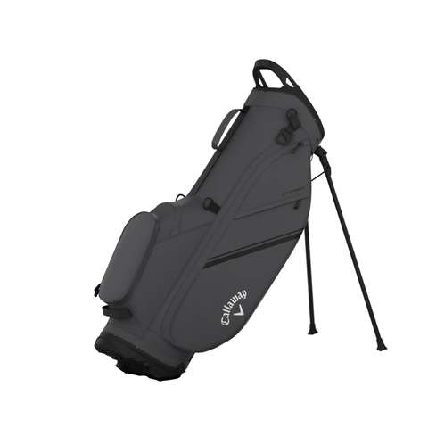 The charcoal Callaway 2025 Chase Stand Bag features a shoulder strap, multiple zippered pockets, and two extended legs for upright support—a lightweight, convenient golf bag from Callaway.