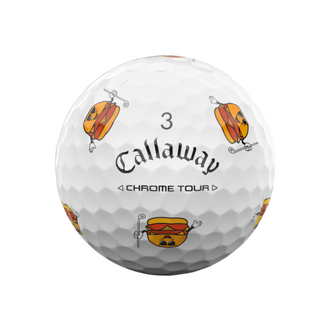 The Callaway 2025 Chrome Tour Turnbox Golf Balls feature a white ball numbered 3 with fun cartoon hot dog graphics wearing sunglasses and holding golf clubs, offering tour-level performance with playful, snack-themed style.