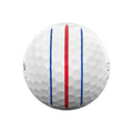 The white Callaway 2025 ERC Soft Triple Track Golf Ball features a center red line with two blue lines for precise alignment, and its dimpled surface enhances performance on the green.