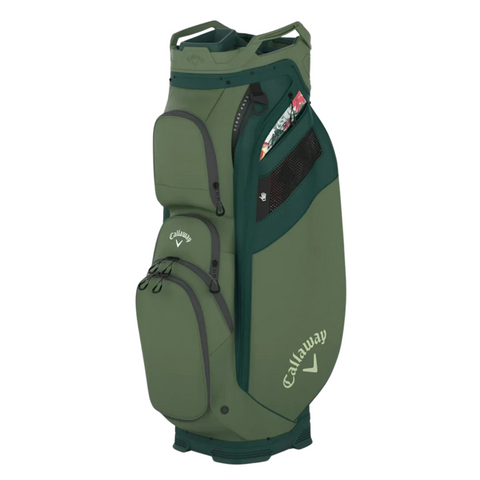 The Callaway 2025 Org 14 Cart Bag is a green golf cart bag featuring a 14-way top, several zippered pockets, and white Callaway logos on the front and side. The bag stands upright against a white background.