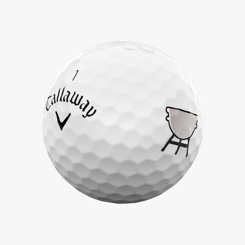 A limited edition Callaway 2025 Supersoft Grill Master golf ball in white, featuring a black logo and gray charcoal grill image, designed for a soft feel and standout style.