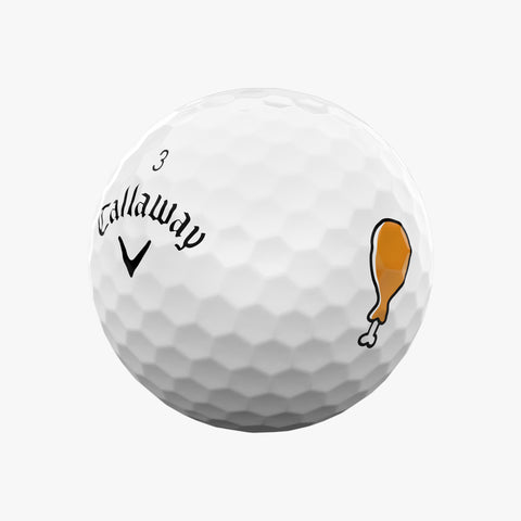 The Callaway 2025 Supersoft Grill Master Golf Ball is a white, limited edition ball featuring a cooked drumstick illustration—ideal for fans of soft feel and unique Callaway collectibles.