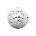 The Callaway 2025 Supersoft Splatter Golf Ball is white with blue speckles, features a dimpled texture for a soft feel, long distance performance, and displays the Callaway logo and the number 1.