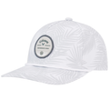 The Callaway Bogey Free Cap by Callaway is a white golf hat featuring a subtle gray palm leaf pattern and a circular Performance Gear patch on the front.