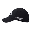 The Callaway Elyte Tour Authentic Performance Pro Hat in black features white embroidered CHROME TOUR text on the side and a front logo. This Callaway hat uses moisture-wicking fabric for all-day comfort on the golf course. Shown from a side angle.