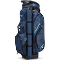 The Callaway Forrester Cart Bag | Prior Generation by Callaway in Navy/Camo/Royal features multiple zippered pockets, mesh panels, and club dividers. It stands upright on a black base and is designed for convenience on the golf course.