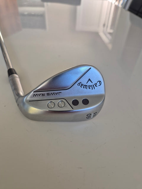 Callaway JAWS Raw wedge head showing 60 degree loft and 10 S grind markings