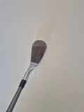 Angled view of the rusty raw face on the lightly used Callaway Jaws Raw wedge
