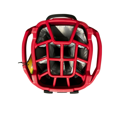 Top-down view of a red helmet with an intricate grid-like interior, similar to the organized 14-way top divider of the Callaway ORG 14 Cart Bag 2024 by Callaway, set against a white background.