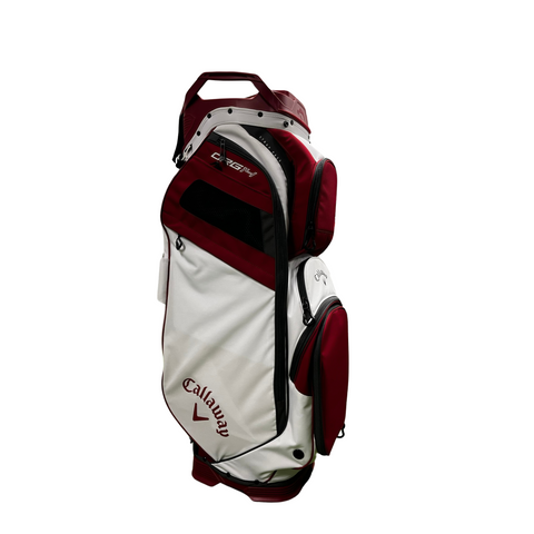 The Callaway ORG 14 Cart Bag 2024, in white and maroon, features a 14-way top divider and multiple zippered pockets. It stands upright on a white background.