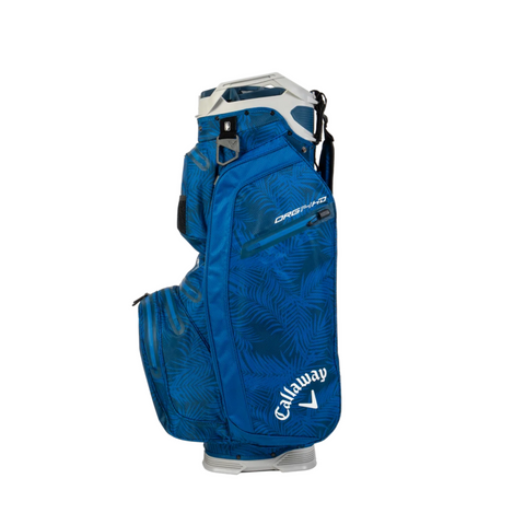 A blue Callaway ORG 14 HD Cart Bag 2025 with a palm leaf pattern, multiple zippered pockets, and sturdy handle is shown against a white background. This waterproof golf bag from Callaway is stylish and practical.
