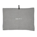 Callaway Outperform Players Golf Towel in silver, showing debossed pattern, centre slit and quick-snap attachment.