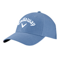 The Callaway Performance Pro Hat by Callaway is a blue golf hat with moisture-wicking fabric, featuring Callaway and a white V-shaped logo embroidered on the front.