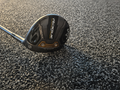 Sole of used Callaway Rogue ST Max women's 5 wood on carpet