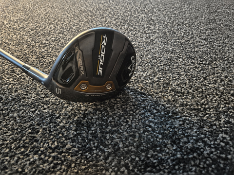 Sole of used Callaway Rogue ST Max women's 5 wood on carpet