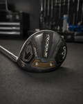 Used Callaway Rogue ST Max women's 5 wood on the dark charcoal Golf 360 workshop bench