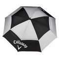 A top-down view of the Callaway Tour Authentic Umbrella by Callaway shows its black and white alternating panels. The Callaway logo and name appear on a black panel of this wind-resistant golf umbrella.