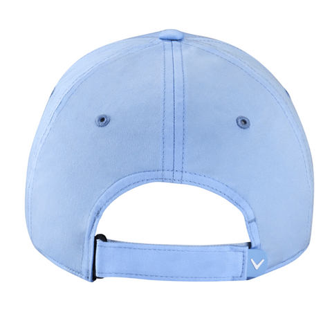 The Callaway Women’s Heritage Twill Golf Cap in light blue is shown from the back, featuring an adjustable strap and a small white V-shaped logo on the right side for a secure, stylish fit and sun protection.