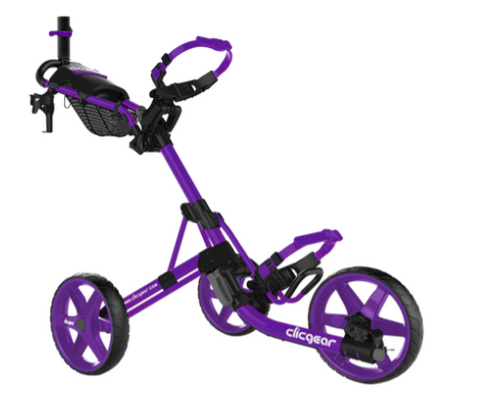 The Clicgear Model 4 Golf Trundler by Clicgear is a purple, three-wheeled push cart with a handlebar and basket, designed to transport your golf bag and accessories on the course.