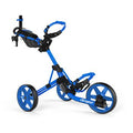 Clicgear Model 4 golf trundler in bright blue, side view, fully extended, with matching blue wheels and 'Clicgear' logos visible on the frame and wheels.