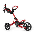 Clicgear Model 4 golf trundler in bright red, side view, fully extended, with contrasting black wheels and 'Clicgear' logos visible on the frame and wheels.