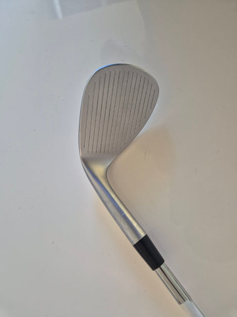 Cobra Snakebite 60 degree wedge face showing minor cosmetic marks and light use