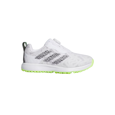 Side view of Adidas Codechaos BOA junior golf shoes in white with black accents, featuring a lime green spikeless rubber outsole for grip and a pull tab at the heel.