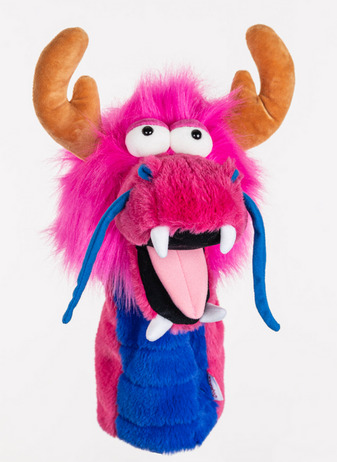 A whimsical dragon plush puppet with bright pink fur, blue accents, big googly eyes, and floppy blue whiskers—styled like Daphne’s Animal Golf Headcovers by Daphne—shown on a white background.