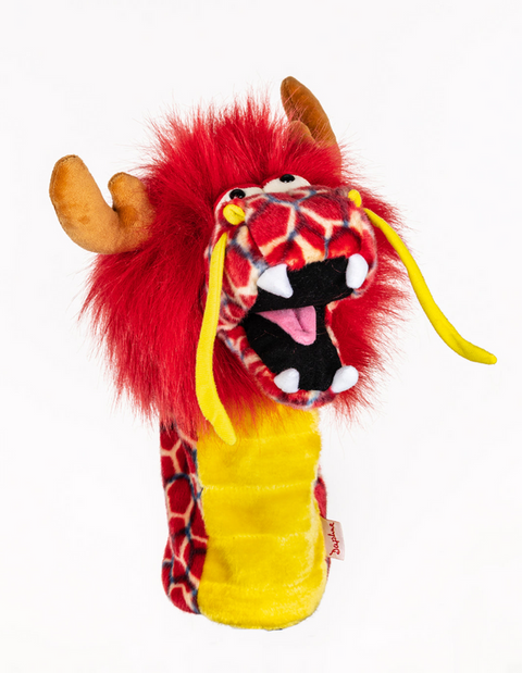 A colorful plush dragon hand puppet features red fur, yellow accents, felt horns, white teeth, yellow whiskers, and a wide mouth—evoking the playful style of Daphne’s Animal Golf Headcovers by Daphne.
