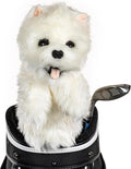 A fluffy white dog driver headcover from Daphne’s Animal Golf Headcovers by Daphne, with a pink tongue, peeks out of a black golf bag beside a metal club head.
