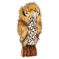 A plush bird puppet from Daphnes Animal Golf Headcovers by Daphne features brown and tan fur, yellow eyes, a large gray beak, leopard-patterned wings, and dark brown feet—perfect for your driver headcover collection.