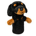 Daphne's Dachshund golf driver headcover, front three-quarter view showing the black and tan plush face, long floppy ears, dark eyes, black nose and protective body on a clean white background