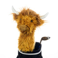 Side view of the Daphne's Highland Cow plush golf driver headcover