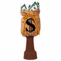 Daphne's Money Bag golf driver headcover, front view showing the tan plush drawstring bag, embroidered dollar sign, novelty banknote detail and brown knitted protective sleeve on a clean white background