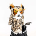 Daphne’s Owl golf driver headcover with yellow eyes and mottled plush feathers, shown on a golf bag.