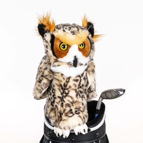Daphne’s Owl golf driver headcover with yellow eyes and mottled plush feathers, shown on a golf bag.