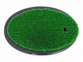 Fiberbuilt Flight Deck oval golf hitting mat on a clean white background