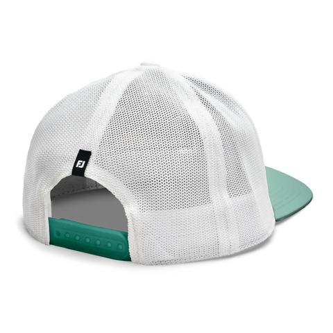 The FootJoy 2025 Press Trucker Hat in green and white features a breathable white mesh back, green bill, snapback closure, and a black and white tag above the adjustable strap—blending retro golf style with modern comfort.