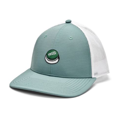 The FootJoy 2025 Press Trucker Hat in green and white features a mesh back, embroidered green button, and PRESS in white letters—combining breathability and retro golf style from the trusted FootJoy brand.
